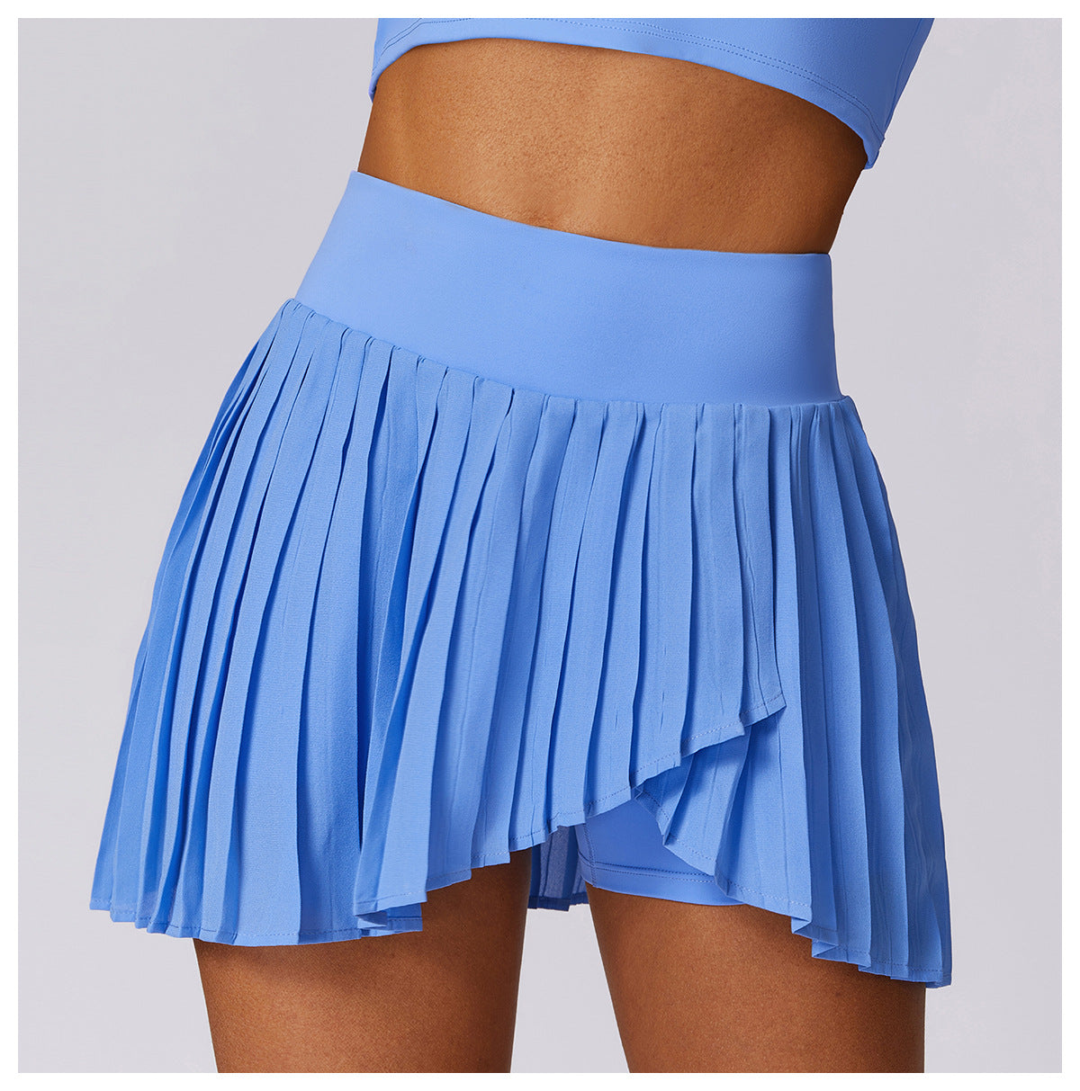 Pleated asymmetric fitness skirt