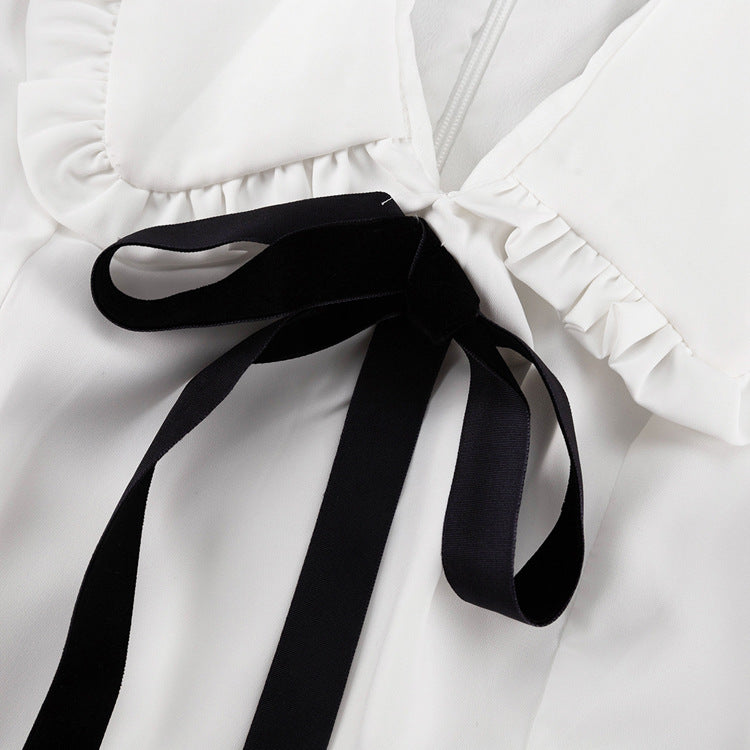Dress with contrast bow