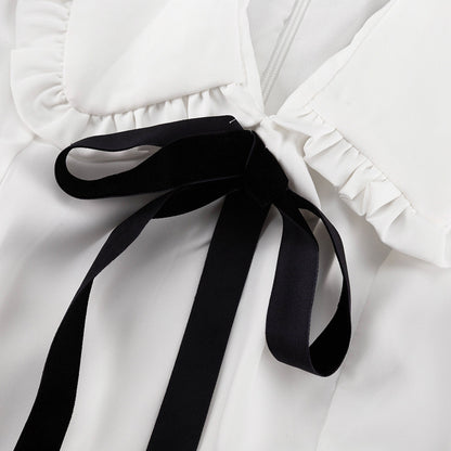Dress with contrast bow