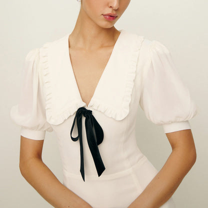 Dress with contrast bow