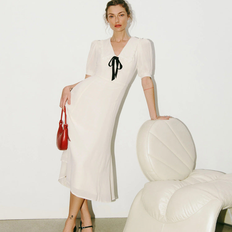 Dress with contrast bow