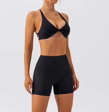 Cross back twisted front sports bra