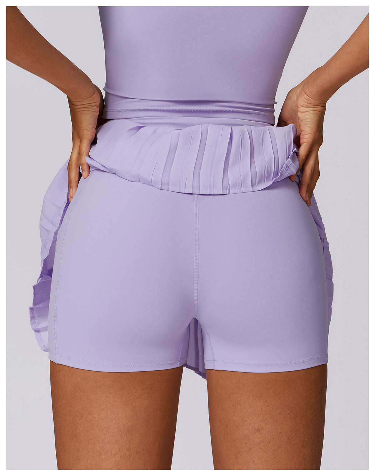 Pleated asymmetric fitness skirt