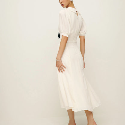 Dress with contrast bow