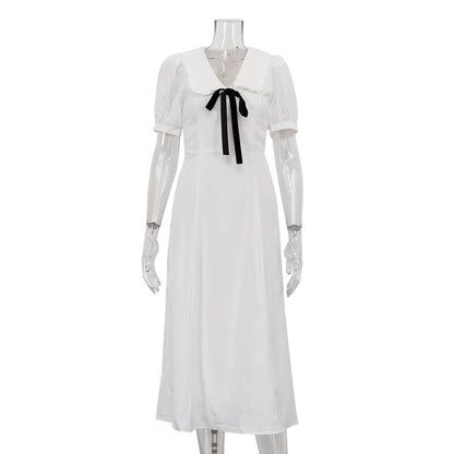 Dress with contrast bow