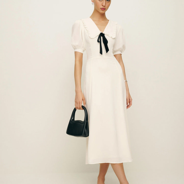 Dress with contrast bow