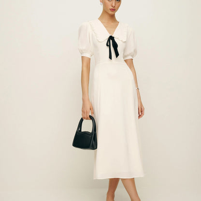 Dress with contrast bow
