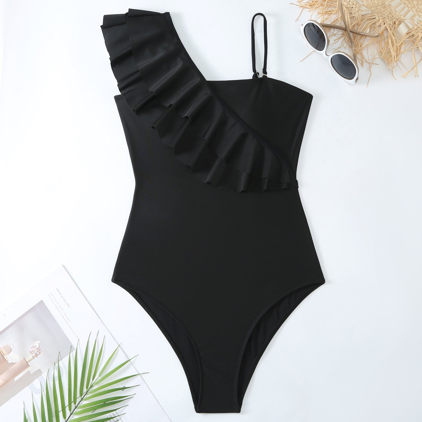 One shoulder swimsuit with matching skirt